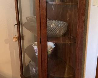 #3 - $250 - Bowfront American oak curio 34Wx11 1/2Dx 62T. has top shelve. 
