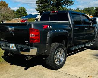 2010 Chevy Silverado LTZ Rocky Ridge Pkg - Vin 3GCRKTE29AG216598. V8. 6.2 liter. K1500. 4WD. Dark Grey. 6" lift provided by Rocky Ridge. Sliding moon roof.  Sliding back window. Real full size spare tire. Warn winch mounted on the brush guard. Tool box. Heavy duty rear axel. Premium stereo system. DVD players in the back of seats. Back up Camera. Super clean interior. High speed wheel alignment done at Baughn alignment, New Shocks, new tie rods, new ball joints on front end & new brakes. $21,700 or Best offer