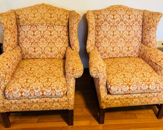 #4 - $200 Pair of orange wing back chairs 