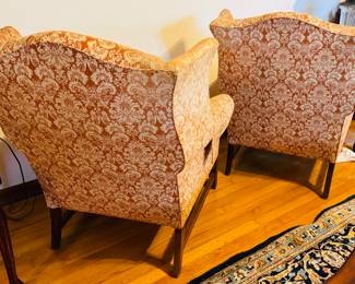 #4 - $200 Pair of orange wing back chairs 