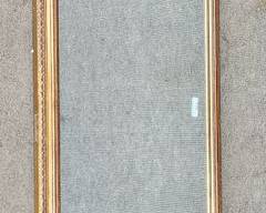 Lovely 20th Century Giltwood Framed Tall Wall Mirror Fancy Basket flower design with C scrolls
