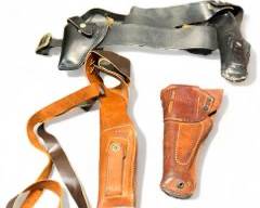 Lot of four Leather Holster three are Bianchi belt Holster and the other one is a Boyt Clip on
