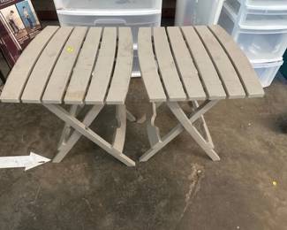 TWO PLASTIC OUTDOOR TABLES
