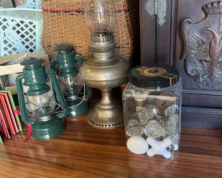 Jar of vintage glass knobs 
Lanterns 
German “wedding” basket