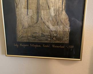 detail of framed brass rubbing