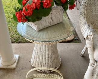 wicker basket, round table with glass top, and tray
