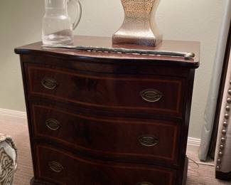 serpentine side chest