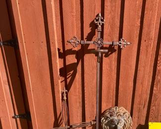 iron cross and lion head decor