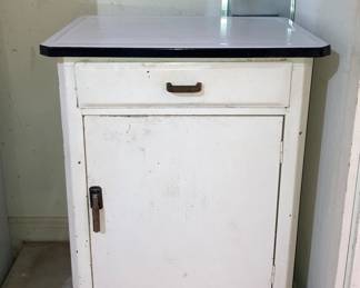 vintage enamel-top cabinet
