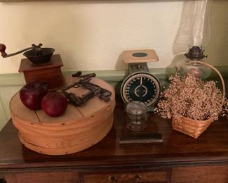 coffee mill, antique apple peeler, cheese box, Wards scale, oil lamp