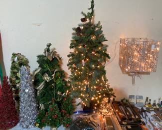 Christmas trees--also a HUGE Christmas tree in its box (on the back porch)