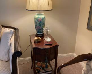 mahogany side table, Oriental lamp, Waterford cross, and a happy Charles and Diana