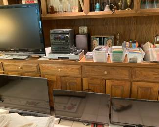 four TVS, Aiwa radio, CDs, cassettes, postcards, etc.