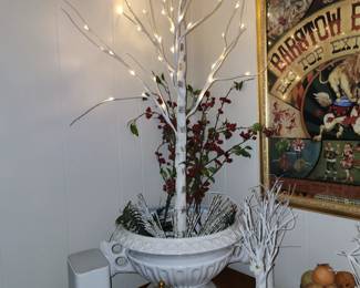 Lighted White Tree sitting in White Planter
