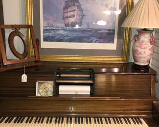 Duo electric player piano in fine working condition with many rolls
