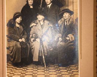 Antique photograph of a Japanese gentleman with Caucasian women