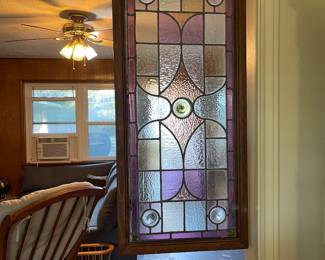 Matching pair of stained glass windows