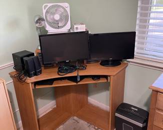 corner desk, monitors, speakers, paper shredder, misc computer supplies and accessories