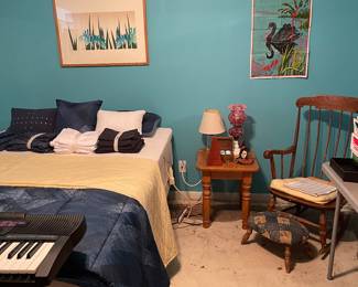 Full-sized mattress and box springs with bed frame and wood spindle rocker