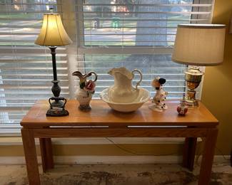 sofa table and variety of lamps