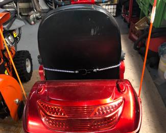 REAR  CLOSE UP VIEW OF THIS ELECTRIC E-WHEELS EW-52 4 WHEEL SCOOTER WORKS VERY WELL WITH NEWER BATTERIES