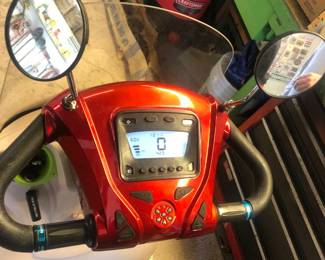 CLOSE UP VIEW DASHBOARD OF DIGITAL SCREEN OF THIS ELECTRIC E-WHEELS EW-52 4 WHEEL SCOOTER WORKS VERY WELL WITH NEWER BATTERIES