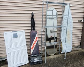 Oreck Vacuum Wall Mirror  Overhead Toilet Storage  Ironing Board