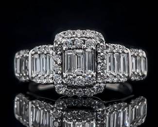 Diamond Ring with Emerald Cut and Round Cut Diamonds in Gold