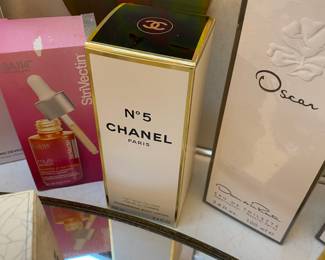 Chanel Paris No.5 Body Lotion, Oscan de la Renta Body Spray, Oscar Esprit D'Oscar Perfume, PMD Clean
Facial Toning Device