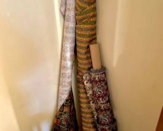 Assortment of Spools of Fabric