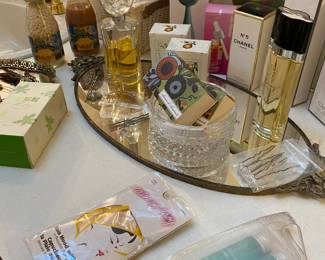 Chanel Paris No.5 Body Lotion, Oscan de la Renta Body Spray, Oscar Esprit D'Oscar Perfume, PMD Clean
Facial Toning Device