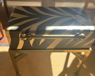 Zebra painted trunk with brass stand