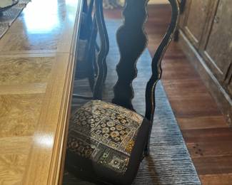 One of the decorated dining chairs 