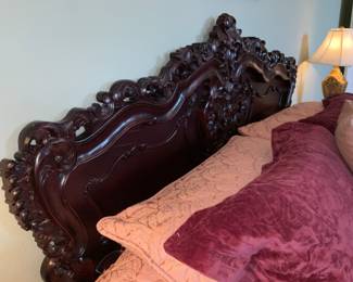 Intricately carved bed 