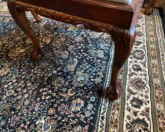 Now $1500 - Was $3000 Carved Chippendale-style Mahogany dining table with 10 carved chairs                                                                                               table: 77" long plus two 18.5" leaves = total length 114"                            