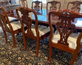 Now $1500 - Was $3000 Carved Chippendale-style Mahogany dining table with 10 carved chairs                                                                                               table: 77" long plus two 18.5" leaves = total length 114"                          