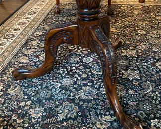 Now $1500 - Was $3000 Carved Chippendale-style Mahogany dining table with 10 carved chairs                                                                                               table: 77" long plus two 18.5" leaves = total length 114"                         