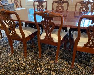 Now $1500 - Was $3000 Carved Chippendale-style Mahogany dining table with 10 carved chairs                                                                                               table: 77" long plus two 18.5" leaves = total length 114"                             
