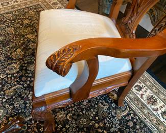 Now $1500 - Was $3000 Carved Chippendale-style Mahogany dining table with 10 carved chairs                                                                                               table: 77" long plus two 18.5" leaves = total length 114"                           