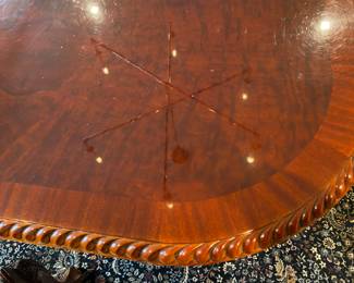 Now $1500 - Was $3000 Carved Chippendale-style Mahogany dining table with 10 carved chairs                                                                                               table: 77" long plus two 18.5" leaves = total length 114"                            