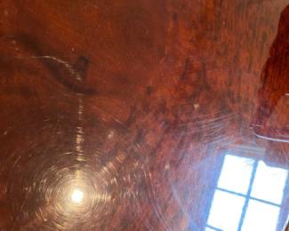 Now $1500 - Was $3000 Carved Chippendale-style Mahogany dining table with 10 carved chairs                                                                                               table: 77" long plus two 18.5" leaves = total length 114"                          