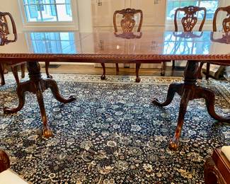 Now $1500 - Was $3000 Carved Chippendale-style Mahogany dining table with 10 carved chairs                                                                                               table: 77" long plus two 18.5" leaves = total length 114"                            