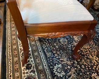 Now $1500 - Was $3000 Carved Chippendale-style Mahogany dining table with 10 carved chairs                                                                                               table: 77" long plus two 18.5" leaves = total length 114"                           