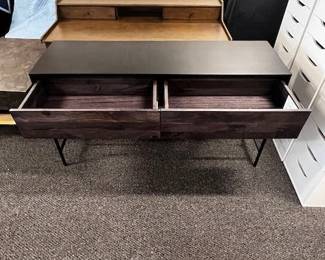 $250 USD Moes 2 Drawer Tobin Black Console Table MTF158-39 Description: With a sleek sophisticated design, this console table emits rich hues from the solid mango wood’s medium and dark stains. Perfect for adding a welcoming addition to your front entry, this console’s two push drawers add versatile storage for everything you need whilst you’re running out the door.
Dimensions: 54″W x 16″D x 30″H
Condition: This is a new piece there is a nick on the left edge that could be painted to bring it to it's original condition. Please see photos for more detail.
Location: Local pick up Portland, OR. Shipping Suggestions available upon request. https://goodbyhello.com/products/copy-of-set-of-2-white-geometric-ladder-bookcase-shelving-unit-mtf158-38?_pos=3&_sid=fbcd51fb9&_ss=r