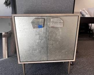 $225 USD West Elm Small Console w/Marble Pulls MTF158-35 Description: This creative small cabinet design by West Elm blends modern style with whimsical details. The Jeweled Small Cabinet. With its silver-leafed drawers and onyx drawer pulls adds extra storage space without sacrificing style.
Dimensions: 28 x 14 x 32H in
Condition: This is a new piece that has suffered a cracked pull during shipping. Please see photos for more detail.
Location: Local pick up Portland, OR. Shipping Suggestions available upon request. https://goodbyhello.com/products/copy-of-teak-natural-rustic-root-trunk-side-tables-mtf158-34?_pos=4&_sid=fbcd51fb9&_ss=r