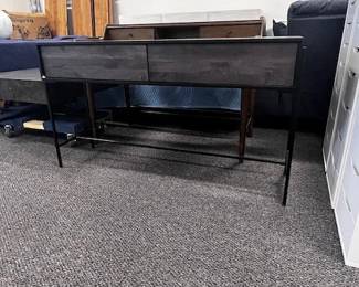 $250 USD Moes 2 Drawer Tobin Black Console Table MTF158-39 Description: With a sleek sophisticated design, this console table emits rich hues from the solid mango wood’s medium and dark stains. Perfect for adding a welcoming addition to your front entry, this console’s two push drawers add versatile storage for everything you need whilst you’re running out the door.
Dimensions: 54″W x 16″D x 30″H
Condition: This is a new piece there is a nick on the left edge that could be painted to bring it to it's original condition. Please see photos for more detail.
Location: Local pick up Portland, OR. Shipping Suggestions available upon request. https://goodbyhello.com/products/copy-of-set-of-2-white-geometric-ladder-bookcase-shelving-unit-mtf158-38?_pos=3&_sid=fbcd51fb9&_ss=r