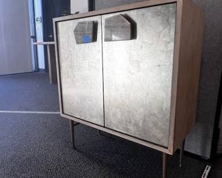 $225 USD West Elm Small Console w/Marble Pulls MTF158-35 Description: This creative small cabinet design by West Elm blends modern style with whimsical details. The Jeweled Small Cabinet. With its silver-leafed drawers and onyx drawer pulls adds extra storage space without sacrificing style.
Dimensions: 28 x 14 x 32H in
Condition: This is a new piece that has suffered a cracked pull during shipping. Please see photos for more detail.
Location: Local pick up Portland, OR. Shipping Suggestions available upon request. https://goodbyhello.com/products/copy-of-teak-natural-rustic-root-trunk-side-tables-mtf158-34?_pos=4&_sid=fbcd51fb9&_ss=r