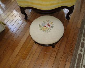 Tis a round foot stool