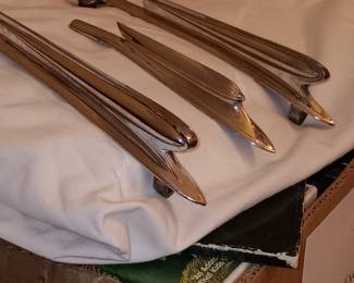 estimated 1942 Plymouth Emblem /mascot.  3pc set asking $225