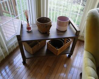 Rolling side table or bar cart, with some very nice decorative pieces